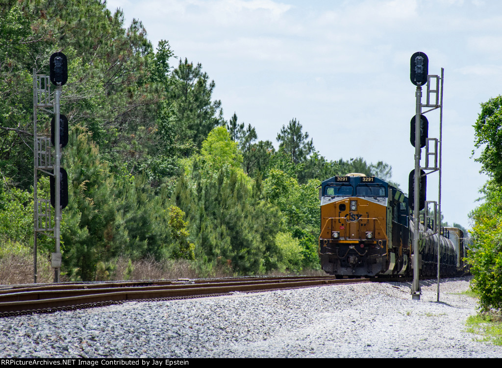A northbound freight waits to enter Baldwin Yard